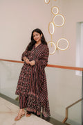 Looking for that perfect balance of tradition and trend? This set features a rich tapestry of Ajrakh-inspired prints and delicate floral borders. Crafted in soft, breathable fabric, it’s designed to keep you comfortable while you shine. At EthnicWeave, we believe every outfit should tell a story—and this one speaks of timeless grace.