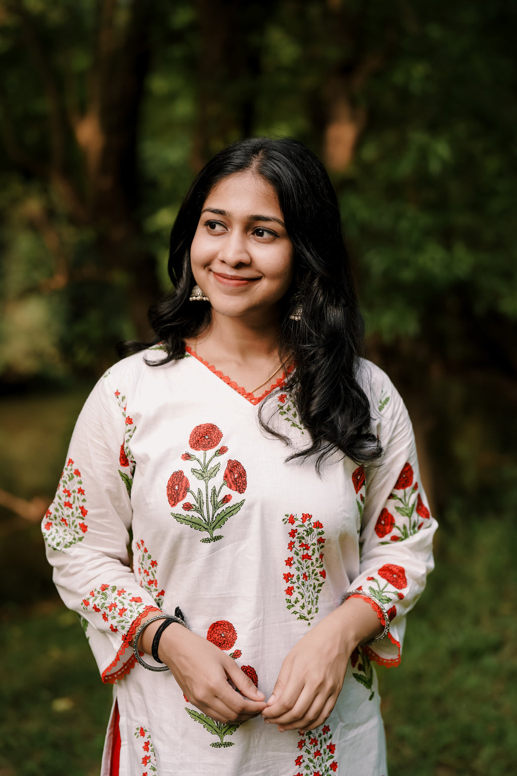There’s a reason why red and white is a timeless favorite. It’s the color of celebrations and everyday joy. Our Gulmohar set features hand-block inspired motifs on a crisp white base, paired with bold red palazzos that command attention. Whether you're walking through a park or a boardroom, this ensemble is designed to make you stand out.