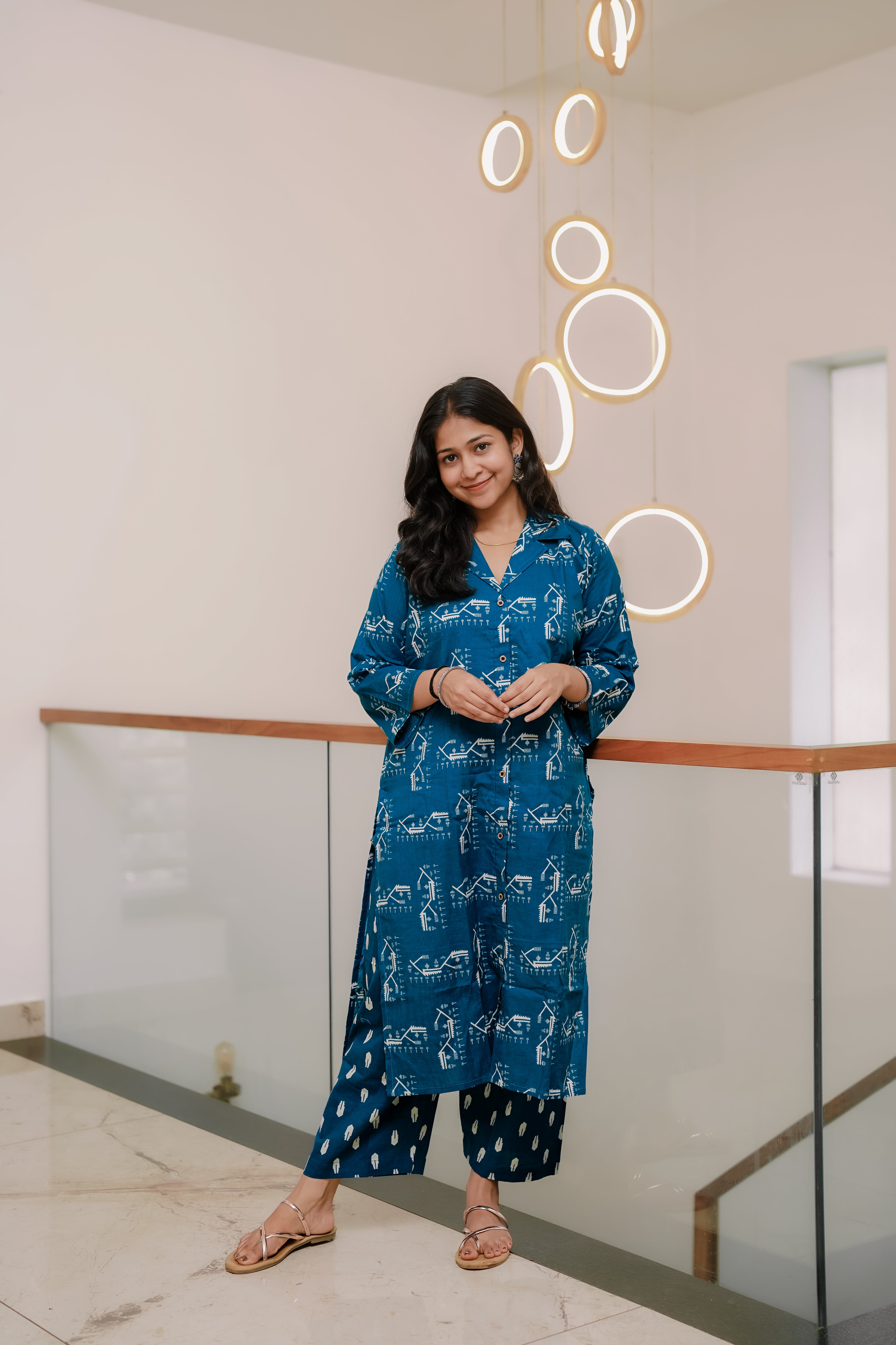 The Peacock Petals set is designed for the woman who loves deep, soulful colors. The contrast between the rich teal base and the earthy cream prints adds a layer of sophistication that is uniquely EthnicWeave.